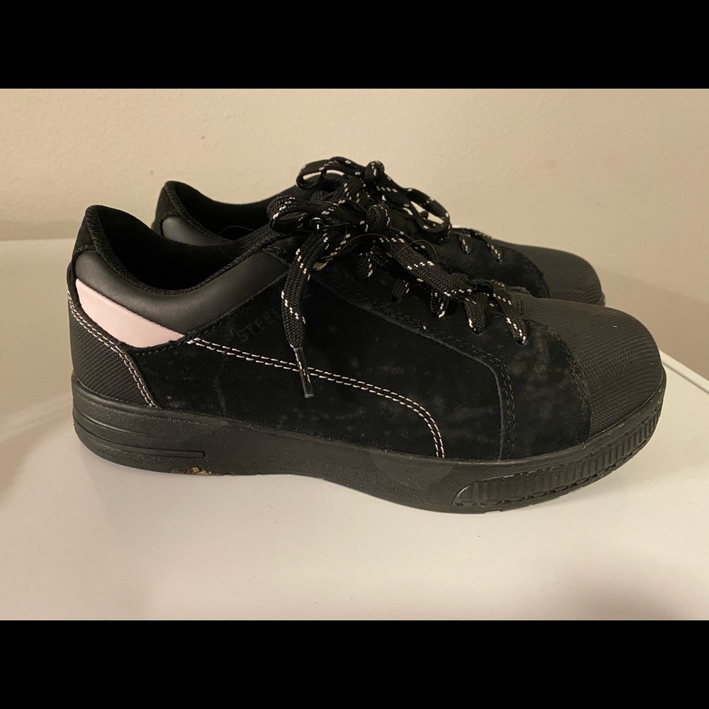 Steel-toed shoes.